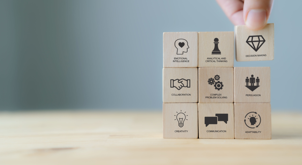 Small wooden blocks labelled with soft skills