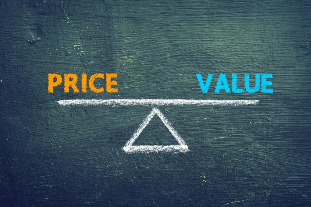 the words price and value balanced on a seesaw